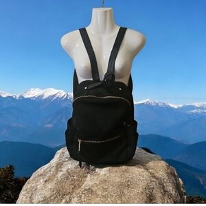 Back Pack Black With Lots If Sections Gold Hardware Good Size Like New